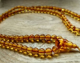 A little bigger CHANGE - 108 baltic amber mala for meditation (size Ø6,5 colour 3)