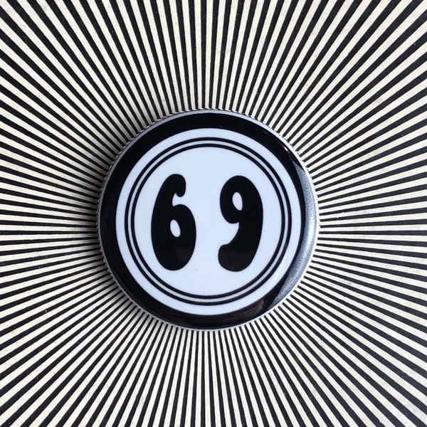 69 black and white 1.25 inch pin