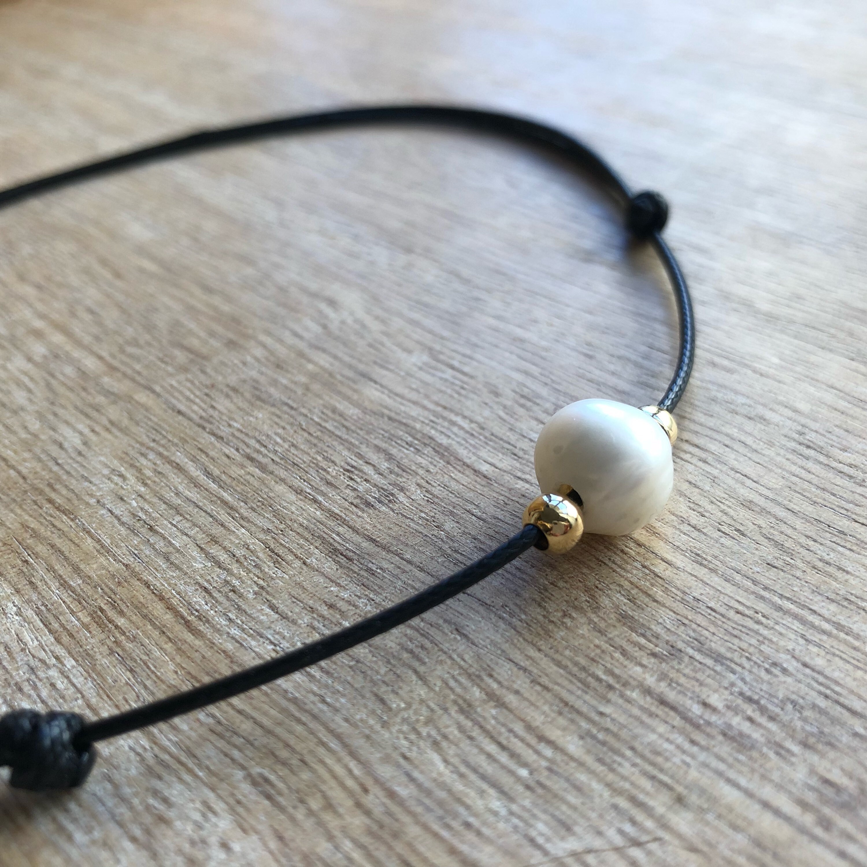White pearl choker necklace black best sale string