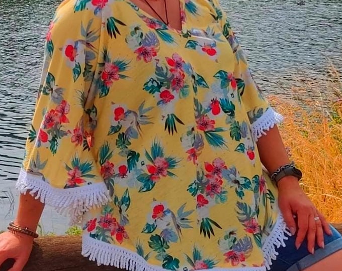Yellow floral poncho with fringes – light, fresh and handmade – ideal for summer and the beach