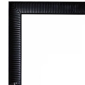 May include: A black picture frame with a textured, ribbed surface pattern. The frame features a mitered corner joint and a clear label indicating a width of 1 inch, shown with a small double-headed arrow graphic at the bottom left corner.