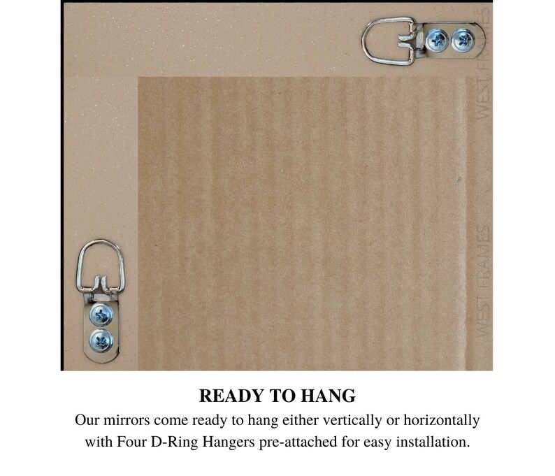 May include: Back of a framed mirror with four pre-attached D-ring hangers for easy vertical or horizontal hanging. The frame is a neutral color, and the text "READY TO HANG" is visible.