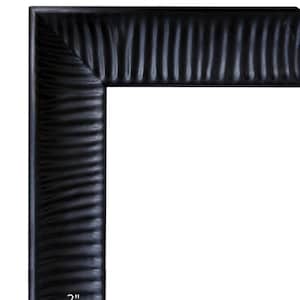 May include: A black picture frame with a textured, rippled surface and a mitered corner joint. The frame width is clearly labeled as 2 inches with a measurement indicator at the bottom left corner, featuring the text westframes.