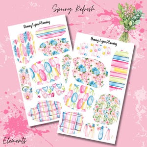 May include: Two sheets of planner stickers with watercolour designs. The stickers feature floral patterns, feathers, and pastel stripes. The text "Spring Refresh" and "Elements" are visible. The brand name "Sammy Lynn Planning" is also visible.