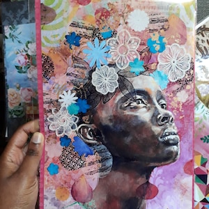 May include: A colorful mixed media painting of a person's face with a crown of flowers. The flowers are white, blue, and pink. The person's skin is dark brown and they are looking up. The background is a mix of pink, orange, and yellow.