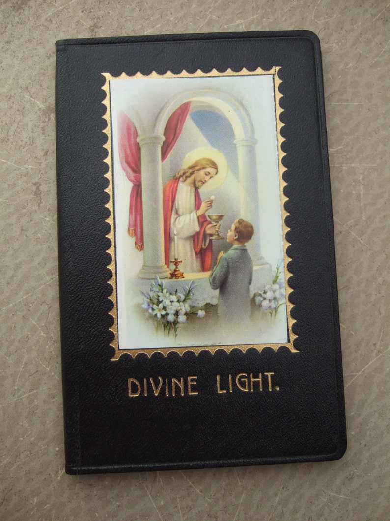 Vintage First Holy Communion Child's Prayer Book Missal black cover with Jesus giving Holy Communion to Boy image 1