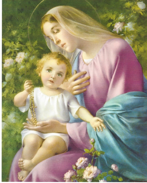 Virgin mary holding holy rosary Virgin mary holding holy rosary
