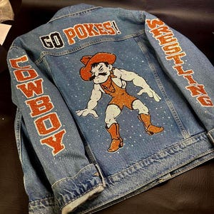 Custom Denim Jacket: Glitter Cowboy Mascot, "Go Pokes!" Team Spirit Wear