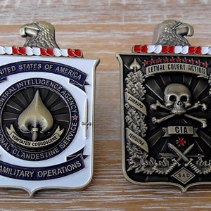 Moneta sfida paramilitare della CIA per le attività clandestine di azioni segrete letali