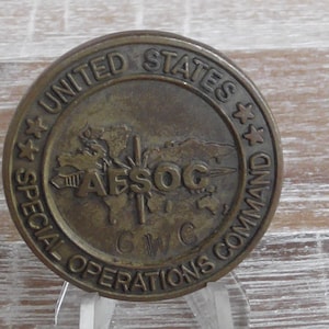 Moneda de desafío n.° 912X del 353.º escuadrón de mantenimiento del Comando de Operaciones Especiales de AFSOC