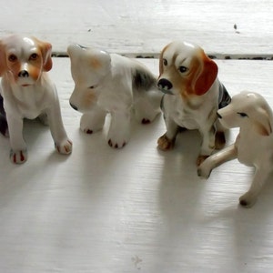 Vintage Porcelain Dog Figurines: Painted Ceramic Collectibles