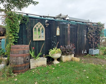 Stunning gothic arch triple light garden mirror