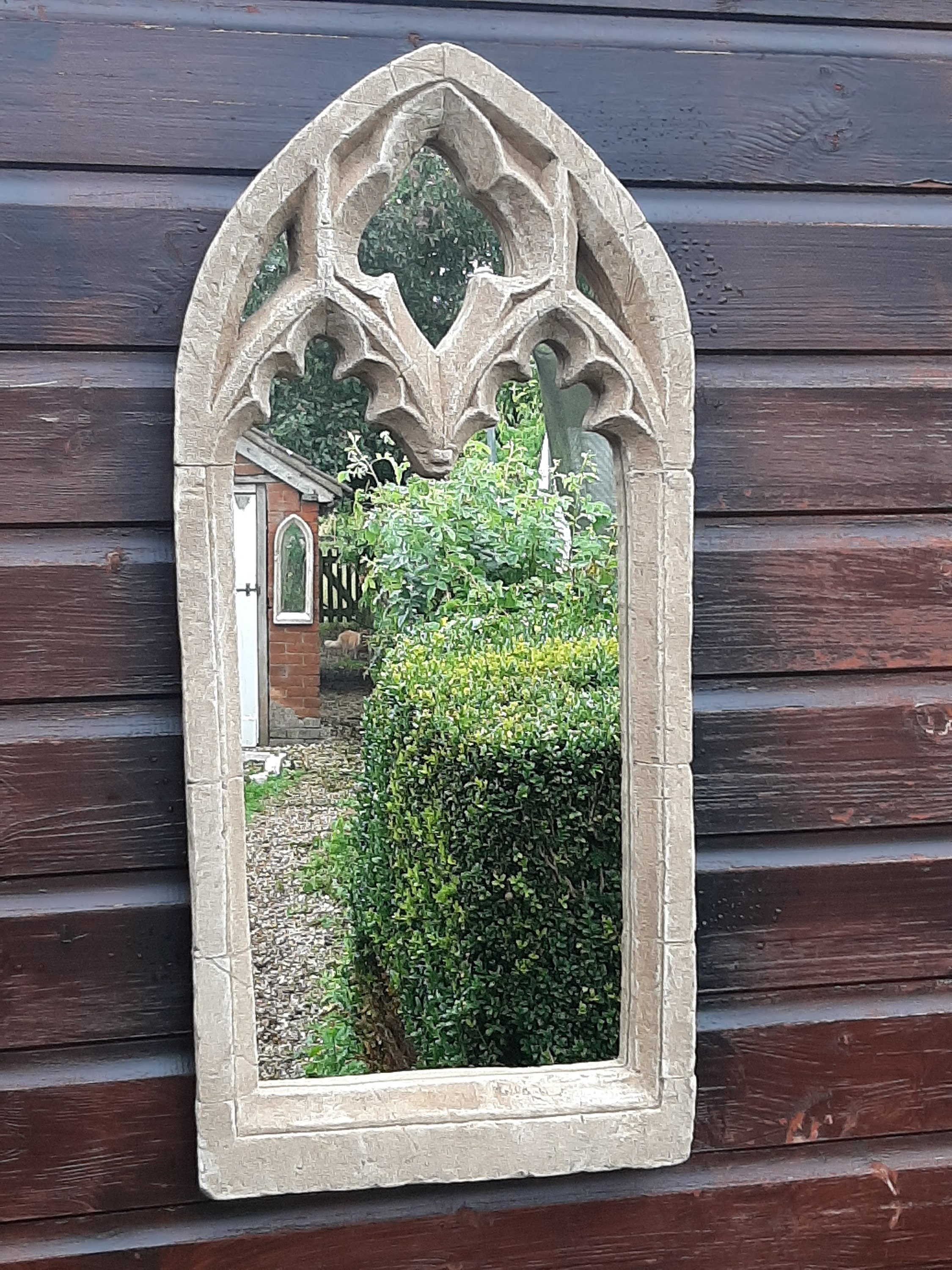 Gothic arch stone garden mirror