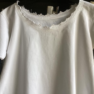 Antique French nightdress. Medium to large hand embroidered night gown in white cotton with beautiful hand embroidered scalloped edge.