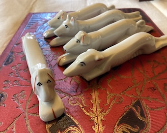 Set of 5 dog knife rests in Limoges porcelain. Vintage French white porcelain dog shaped knife rests.