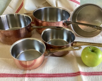 Set of 5 copper, stainless steel lined pans. Vintage French copper pans, stainless steel lined, excellent condition.