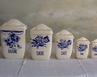Set of vintage French canisters in white porcelaine with blue flowers. 5 Luneville storage pots. Art Deco cannisters. Ceramic storage jars.