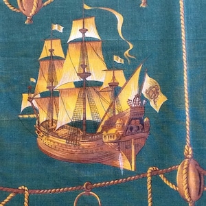 Vintage French fabric with sailing ships. Bottle green and yellow cotton material with boats. 2.3 m x 1.17 m. ( 2 yds 18 ins x 46 ins ).