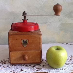 Vintage French Peugeot Freres coffee mill. Red coffee grinder in good condition.