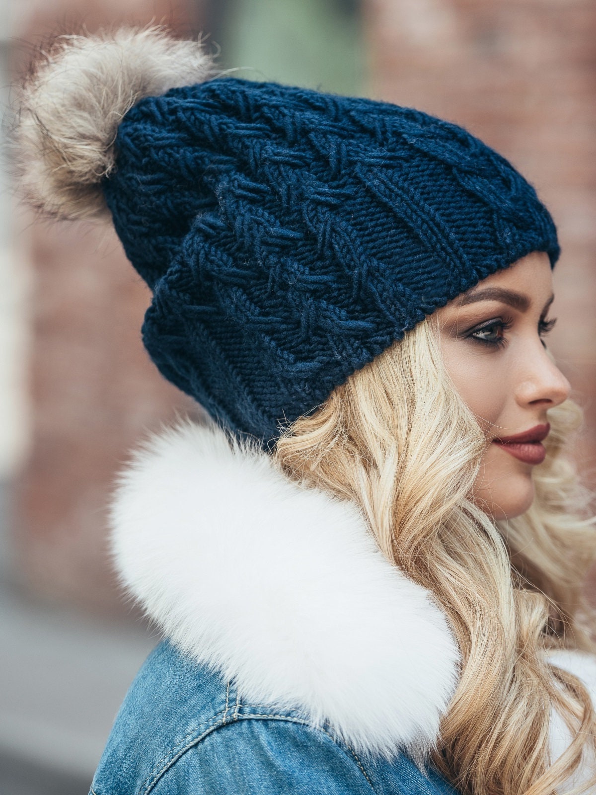 women's wooly hats with fur pom pom