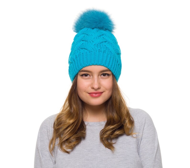 beanie hat with large pom pom
