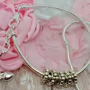 Charm bracelet Holds large hole beads, Holds  style beads and charms, European Charm Bead designed to fit your threaded Bracelet