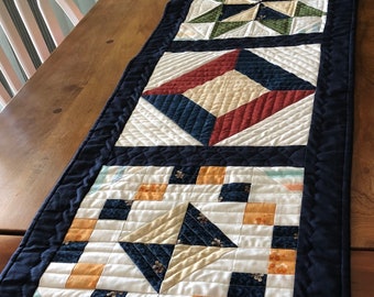 Gift a generous-sized quilted table, island, or bed runner