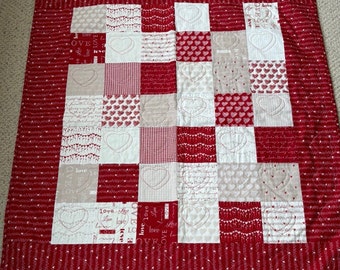 Love, live, laugh Valentine quilted throw in red, white, and taupe
