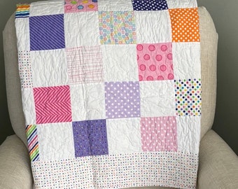 Polka-dot quilt, or casual throw for a pop of color