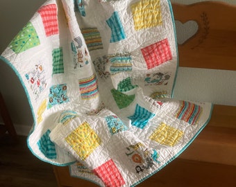 Colorful and bright quilted throw, wheelchair coverlet, or for a baby