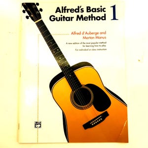 Alfred&#39;s Basic Guitar Method Vol 1 Songbook 11 x 8 PB