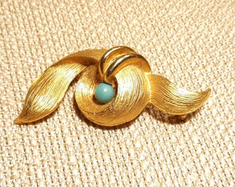 Broche turquoise vintage avec noeud et ruban