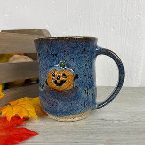 Hand Carved Jack-o-Lantern Mug: Wheel-Thrown Ceramic, Ocean Blue Glaze
