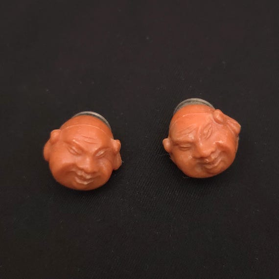 Vintage 1970s Orange Plastic Happy Buddha Head Earrings