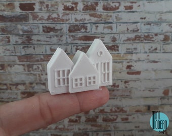 Coloured plastic Christmas cottage decoration in 1:12 scale for dollhouses
