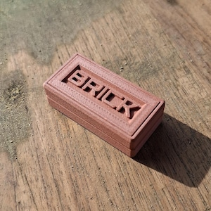 Juguete antiestrés "Sick Brick" de ladrillo rojo, filamento con infusión de cobre sólido, juguete EDC háptico de 3 clics con sonido crujiente o silencioso (menos crujiente).