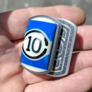 Deslizador antiestrés con incrustaciones de bola de billar azul de la suerte n.° 10, filamento que brilla en la oscuridad, juguete EDC háptico crujiente de 3 clics