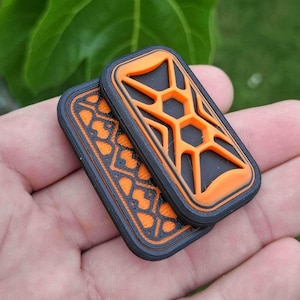 NEO-SLING Fidget slider in Orange and Black | 3-clicks very crunchy haptic EDC toy | Portable 3d click & slide | Everyday carry pocket art