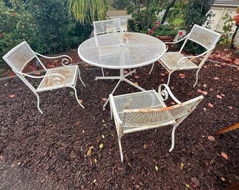 Vintage patio set, made of wrought iron, Mesh top table and 4 armchairs, circa 1960’s, not sure what brand it is, made in USA, MCM