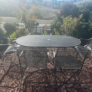 Vintage Wrought Iron Patio Set by Russell Woodard, Oval table and 6 armchairs, Table is 72” by 42”,  Salterini collection, MCM, Made in USA