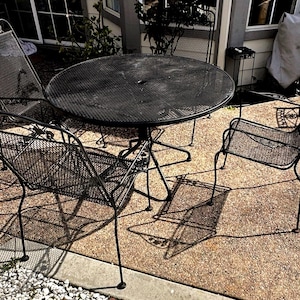 Vintage patio set, made of wrought iron, Woodard brand name, flower and leaf pattern, stacking chairs, MCM, 48” diameter,