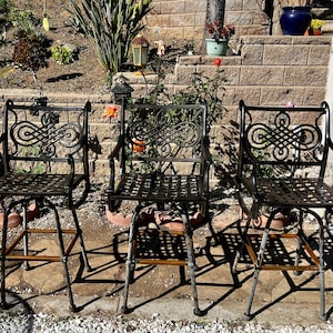 Set of 3 Bar Height swivel armchairs by Cast Classics, Monte Cristo Collection(cigar emblem), in great condition, each retails for 1059