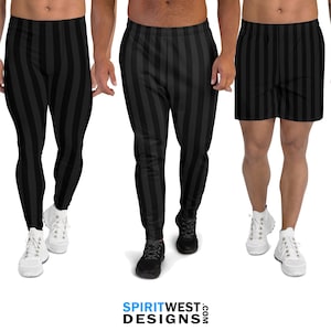 May include: Three models wearing black and gray striped pants and shorts. The pants are a jogger style with a drawstring waist. The shorts are a casual style with a flat waistband. All three models are wearing white sneakers.