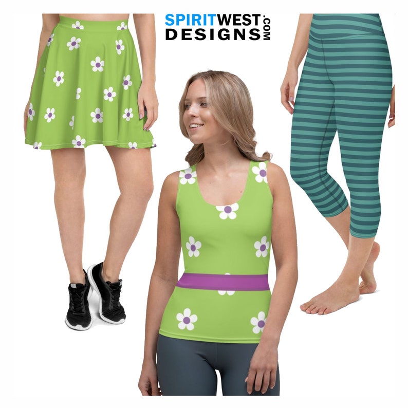 May include: A green tank top with a white flower pattern and a purple waistband. A green skirt with a white flower pattern. Green and blue striped leggings.