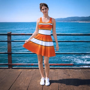 orange and white striped dress Short The fitted top flows into a breezy midi skirt Orange And Yellow Stripes Summer