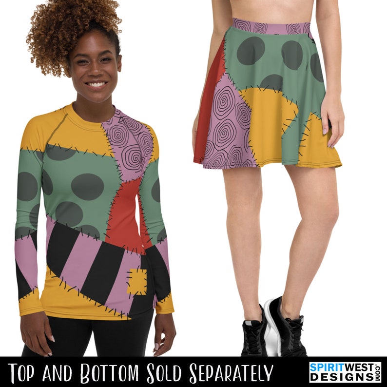 May include: A long-sleeved shirt and a skirt with a patchwork design featuring various colors, including yellow, green, red, purple, and black. The fabric has a stitched look, resembling a stitched-up doll. The text "Top and Bottom Sold Separately" is at the bottom of the image.