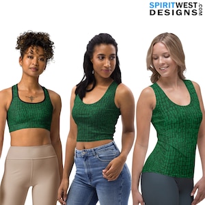 May include: Three women wearing green tank tops with a crocodile skin pattern. The tank tops are sleeveless and have a scoop neck. The women are wearing different bottoms, including beige shorts, blue jeans, and gray leggings.