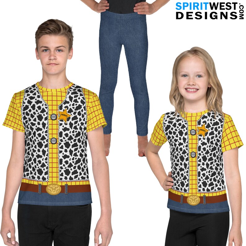 May include: Two children wearing yellow and red plaid shirts with a black and white cow print vest. The shirts have a sheriff's star badge on the front. The children are wearing blue jeans.