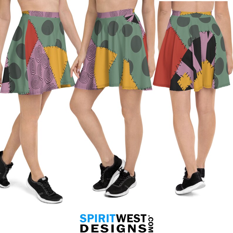 May include: A colorful patchwork skirt with a green, yellow, red, and purple design. The skirt has a flared silhouette and is made of a soft, comfortable fabric.