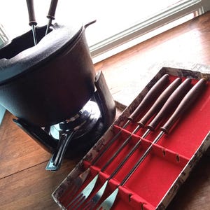 Vintage French fondue set cast iron quality fondue set with original boxed forks unique design French manufacture super quality fondue set